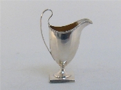 Appraisal: A George III silver helmet cream jug maker s mark