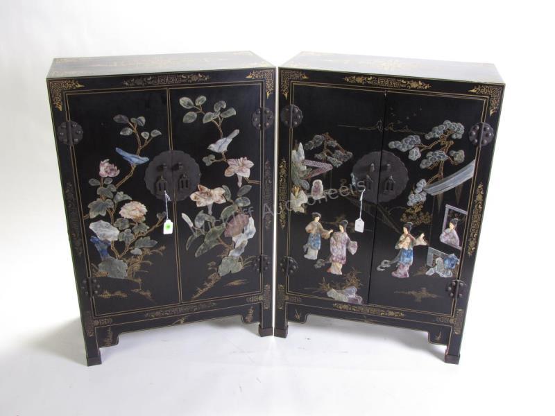 Appraisal: A pair of Oriental Chinoiserie cabinets with jade carvings depicting