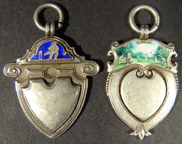 Appraisal: Two silver cricket medals with enamelled decoration dated and