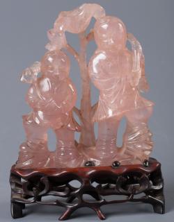 Appraisal: Chinese Carved Rose Quartz Double Figure With carved wooden stand