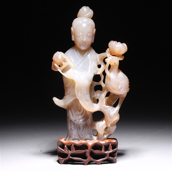 Appraisal: Chinese carved agate Guanyin statue with phoenix bird on wood