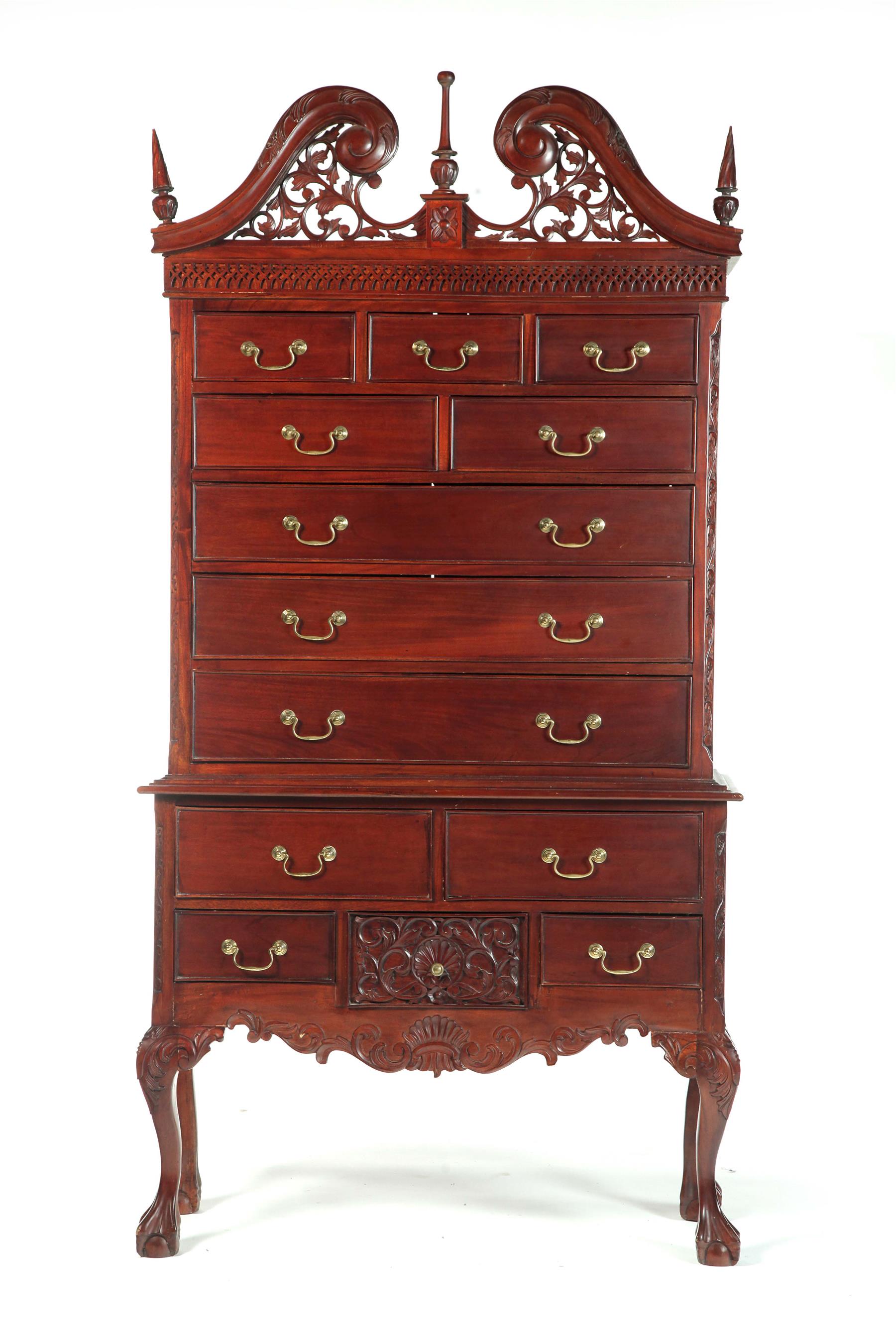 Appraisal: CHIPPENDALE-STYLE TWO-PIECE HIGH CHEST Asian late th century mahogany Fretwork