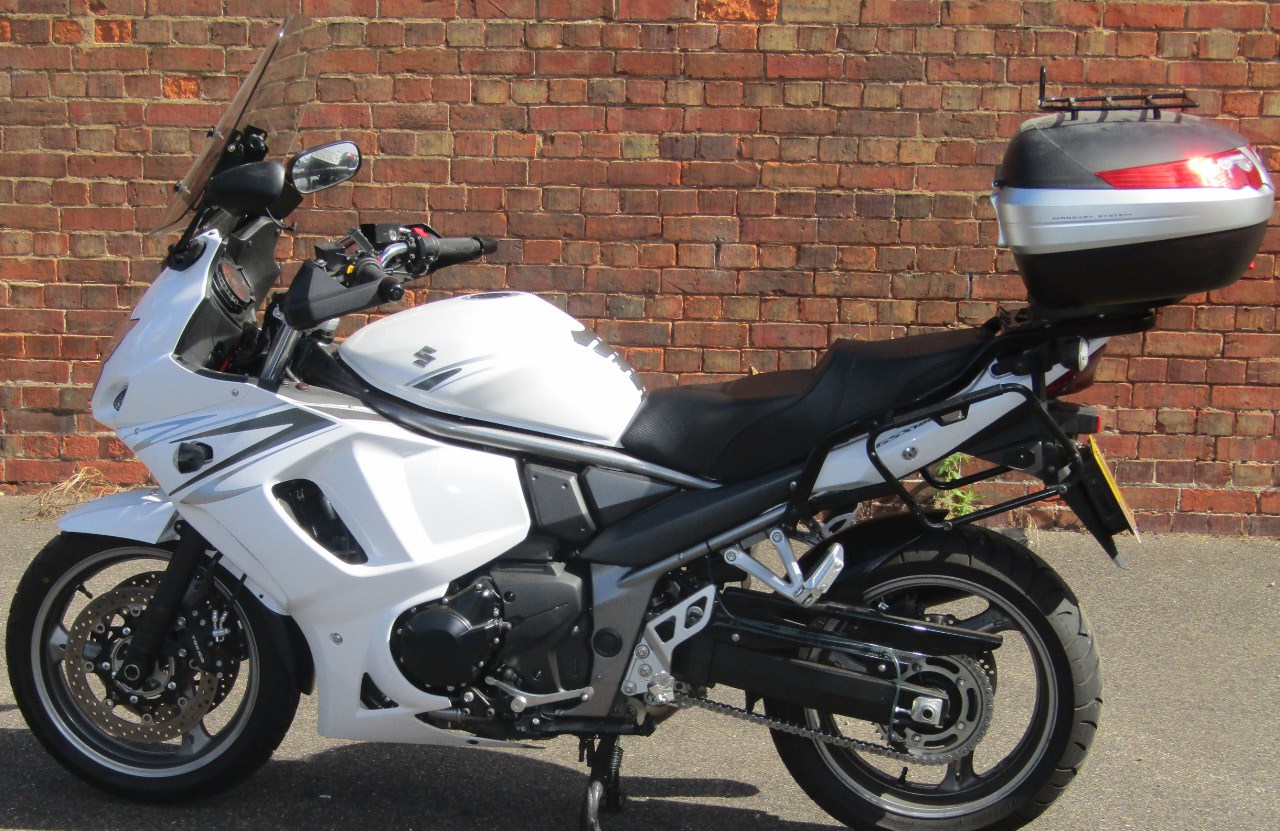 Appraisal: A Suzuki GSX motorcycle white recorded miles To be sold