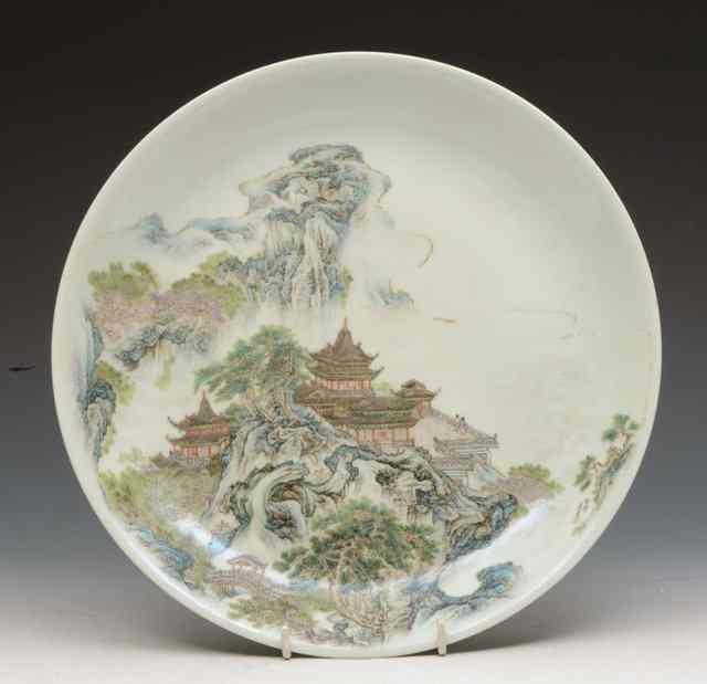 Appraisal: A CHINESE ENAMELLED SHALLOW DISH decorated with a mountain and