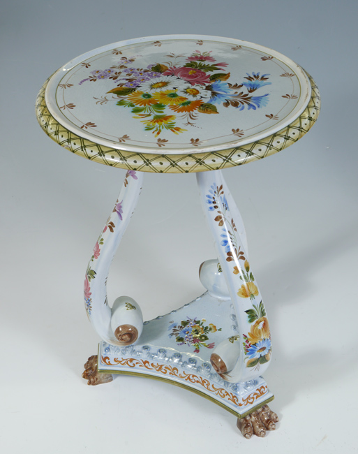 Appraisal: ITALIAN PORCELAIN SIDE TABLE Floral decorated with scroll supports paw