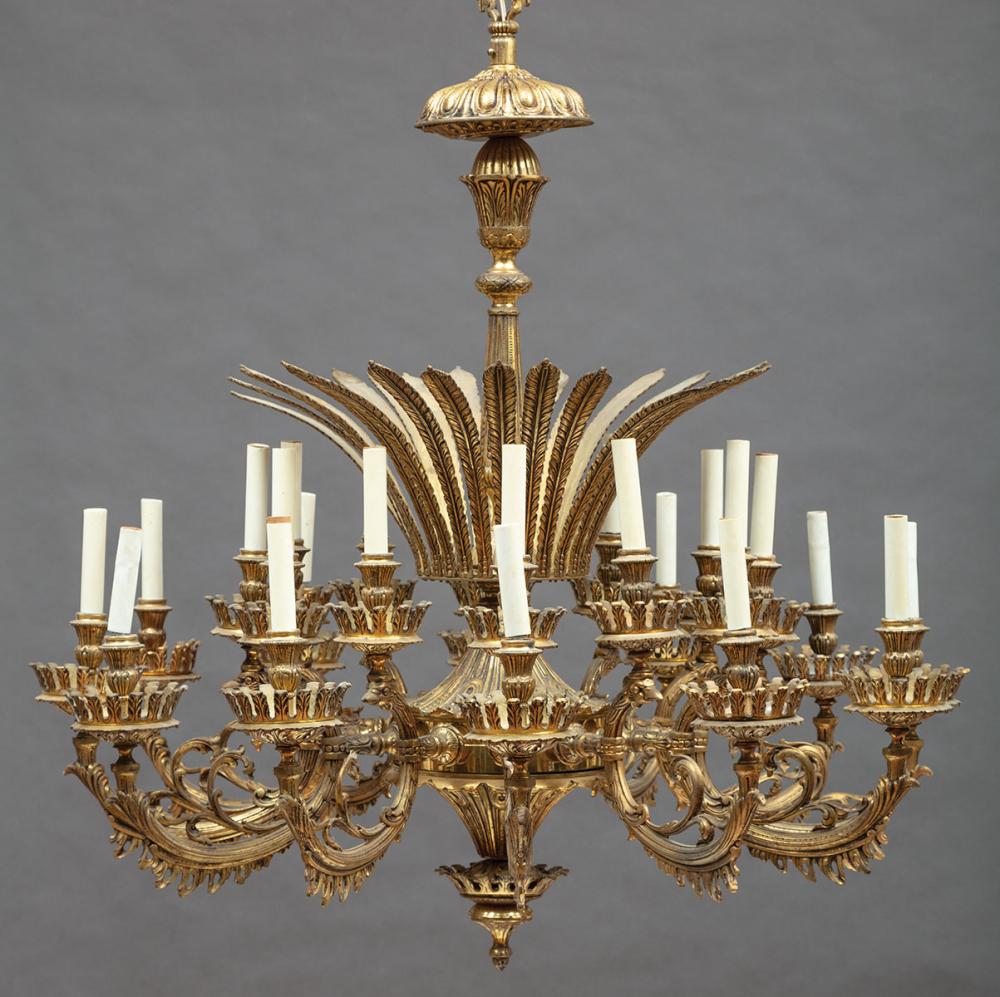 Appraisal: Belle Epoque Bronze Twenty-Four Light Chandelier feathered corona scrolled arms