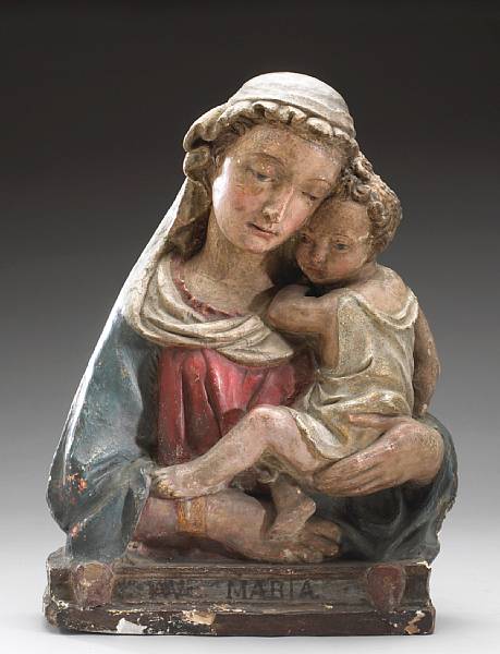 Appraisal: An Italian polychrome stucco relief of the Madonna and Child