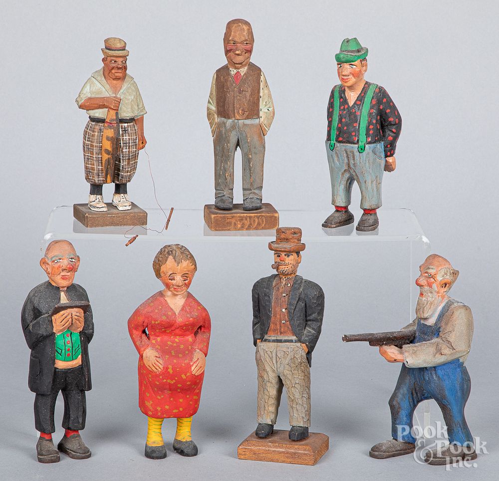 Appraisal: Seven carved and painted figures Seven carved and painted figures