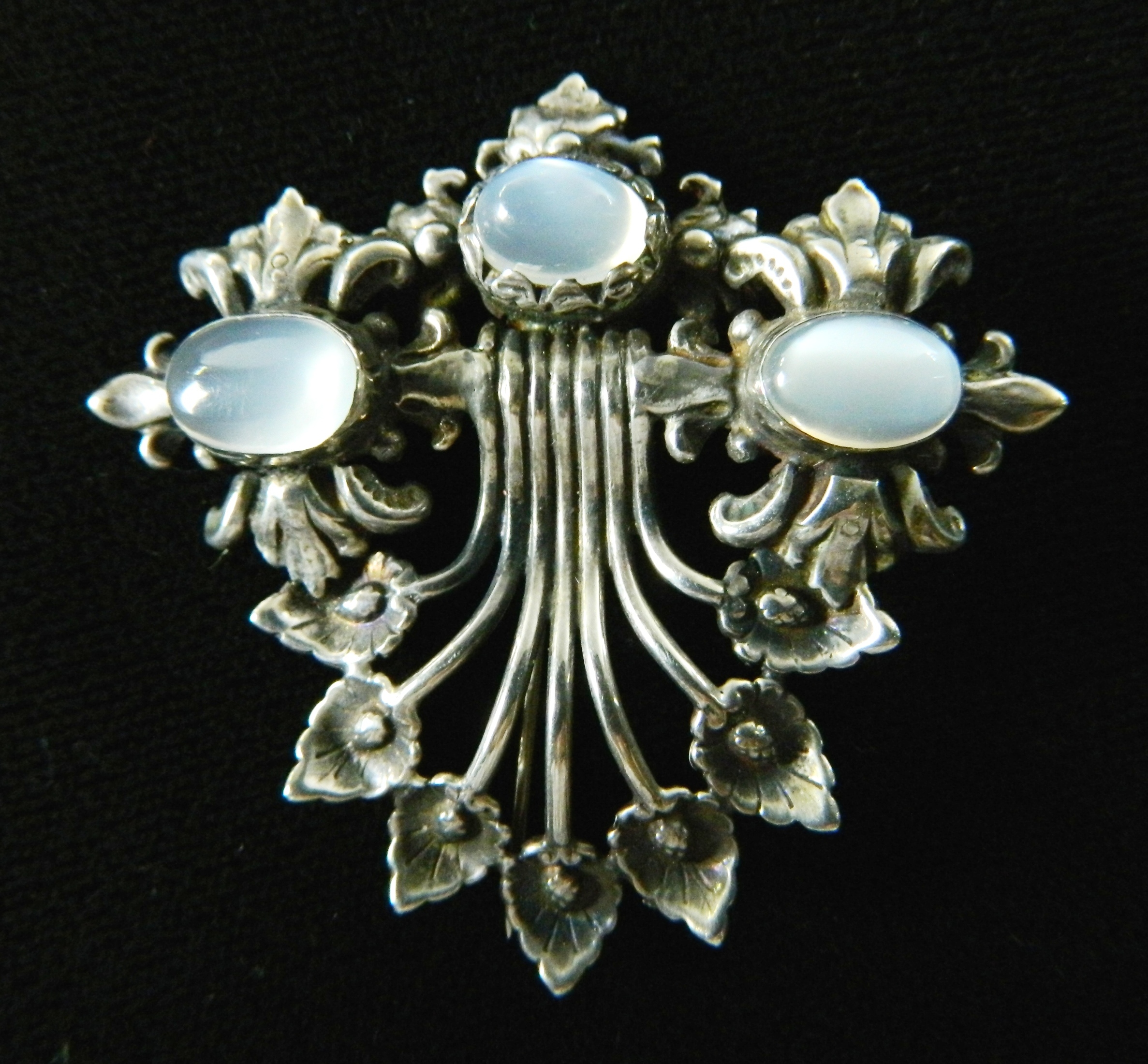 Appraisal: Sterling silver brooch sterling silver and moon stones marked Sterling