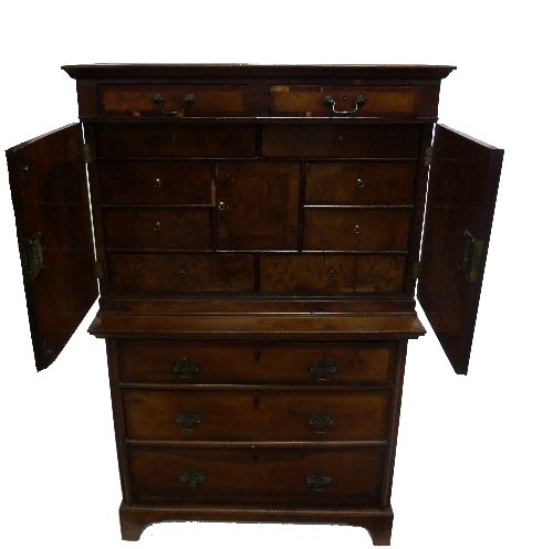 Appraisal: A th Century walnut chest with moulded cornice and two