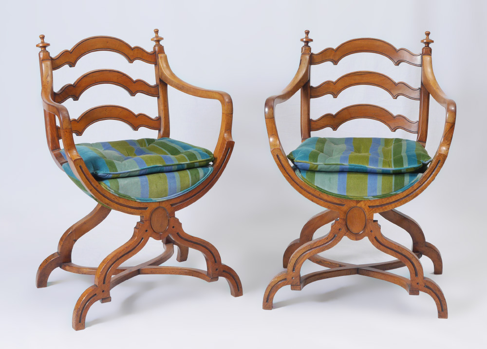 Appraisal: PAIR OF SAVONAROLA STYLE CHAIRS Shaped rung ladder back and