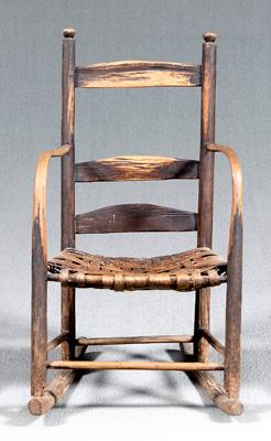 Appraisal: Tennessee bentwood rocking chair bentwood arms carved finials woven split