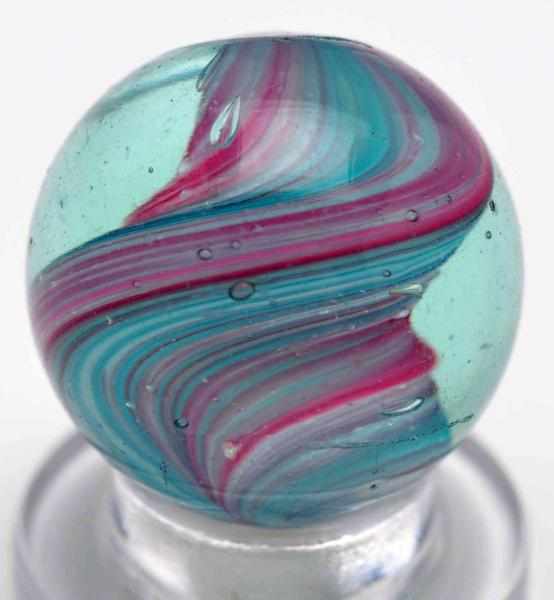 Appraisal: Naked Onionskin Ribbon Marble Description Light blue glass Onionskin is