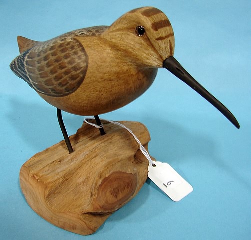 Appraisal: Standing Sandpiper on driftwood by H V Shourds