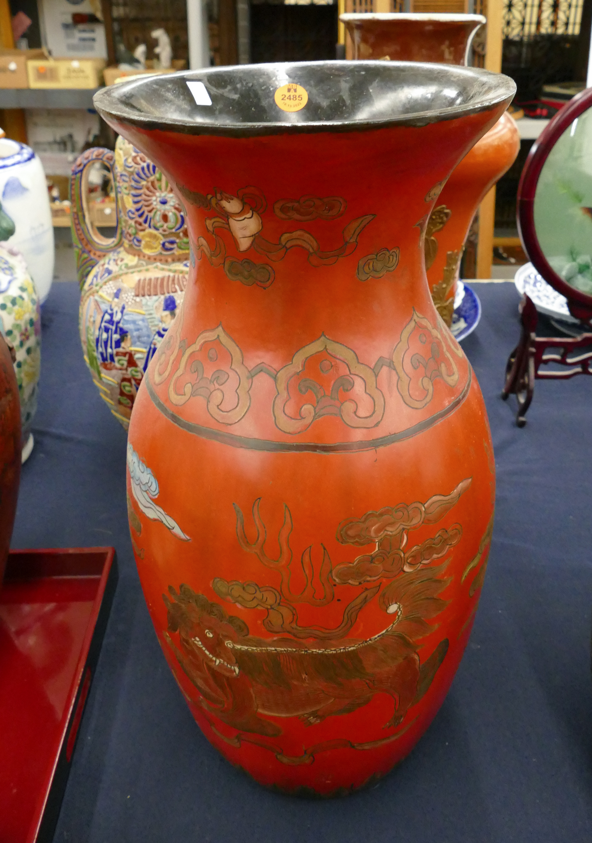 Appraisal: Chinese Red Lacquered Foo Lion Vase- ''