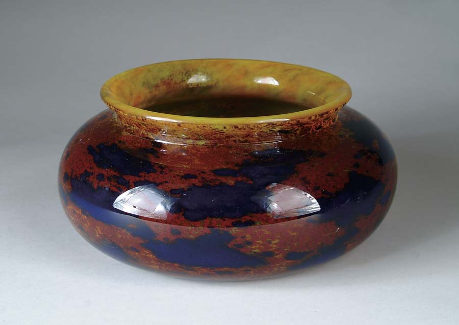 Appraisal: SCHNEIDER CENTERPIECE BOWL All over mottled colors of rust and