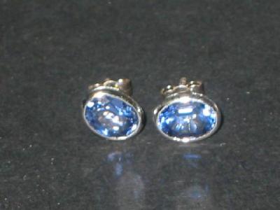 Appraisal: A PAIR OF SAPPHIRE EAR STUDS the oval cut light