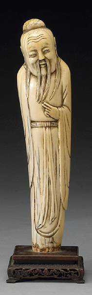 Appraisal: A pieced ivory sage th th Century The bearded figure