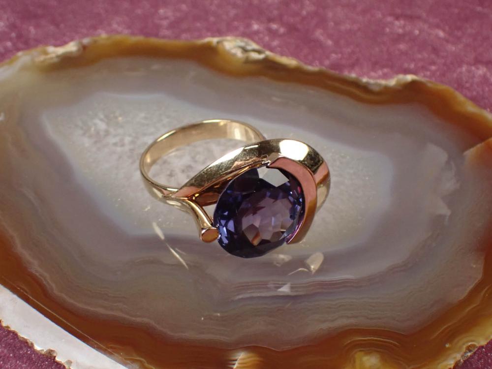 Appraisal: LAB CREATED ALEXANDRITE AND FOURTEEN KARAT GOLD RING The yellow