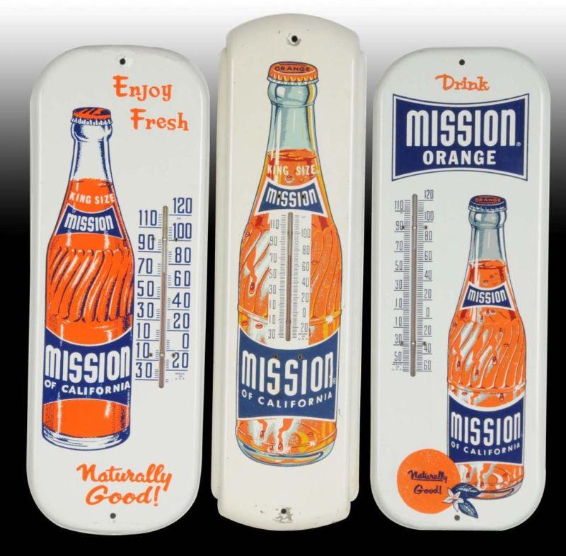 Appraisal: Lot of Mission Orange Tin Thermometers Description Circa s and