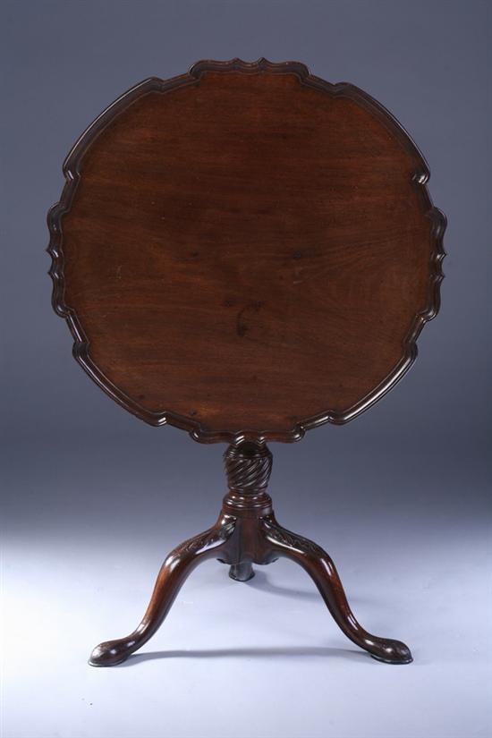 Appraisal: CHIPPENDALE TILT-TOP TRI-POD TABLE th century Serpentine molded-edge pie-crust top