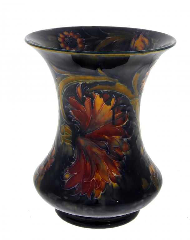 Appraisal: A MOORCROFT SPANISH VASE DESIGNED BY WILLIAM MOORCROFT of spool