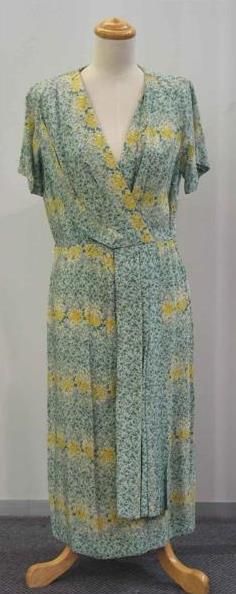 Appraisal: Day dress in floral printed green and yellow rayon circa