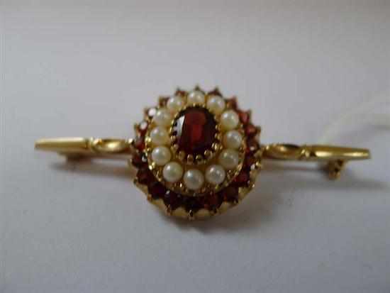 Appraisal: A GARNET AND PEARL BROOCH IN CT GOLD