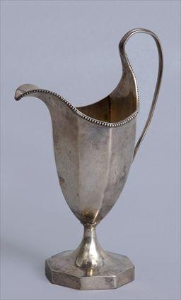 Appraisal: GEORGE III SILVER OCTAGONAL HELMET-FORM CREAMER Hester Bateman London with