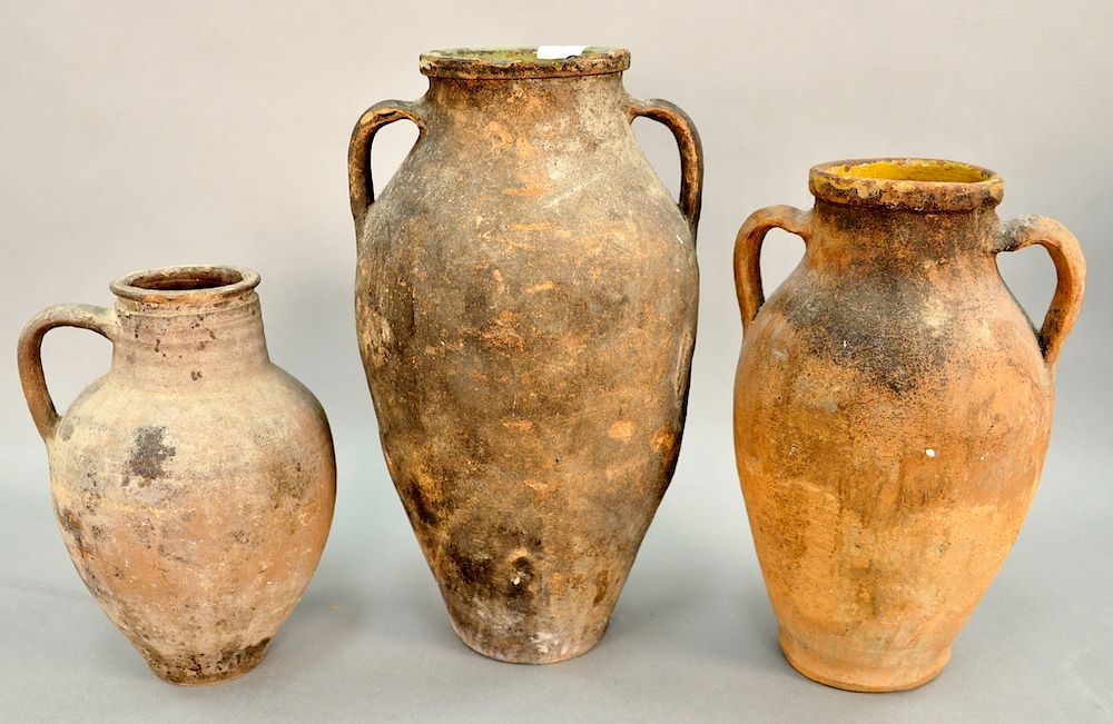 Appraisal: Group of three earthenware pots one with green glazed interior