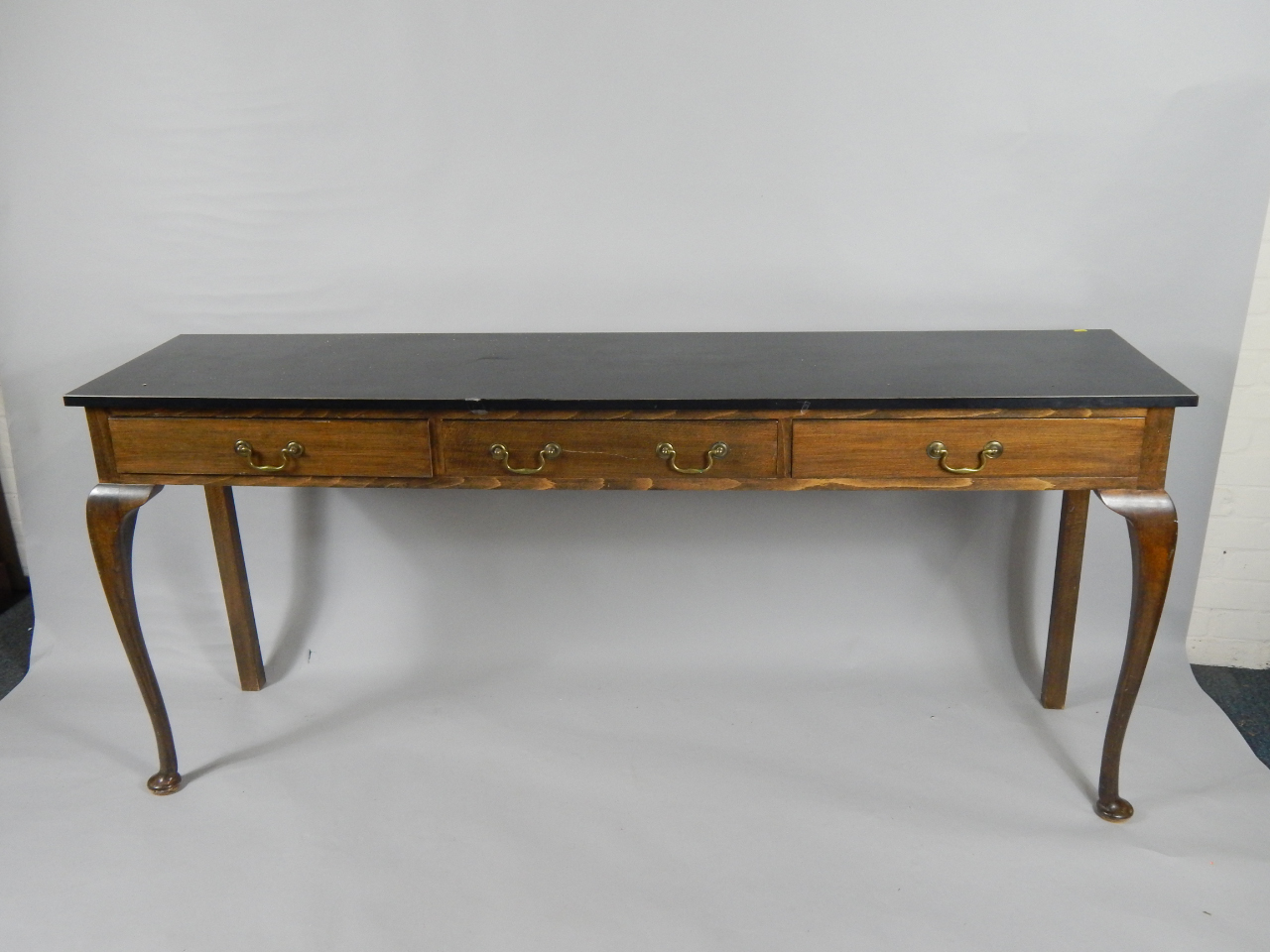 Appraisal: A Georgian style oak serving table with a black formica