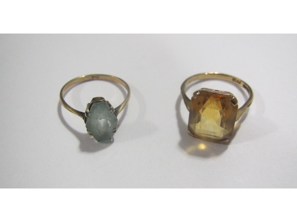 Appraisal: Two ct gold gem set single stone rings one with