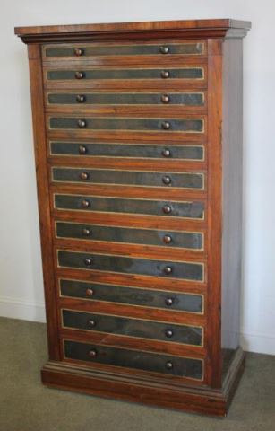 Appraisal: Unusual Rosewood Tall Lockside Chest With leather drawer fronts From