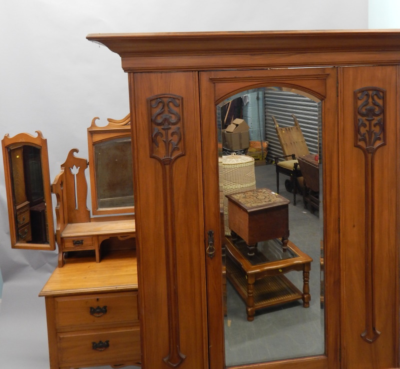 Appraisal: A late Victorian pale walnut wardrobe with single mirror doors