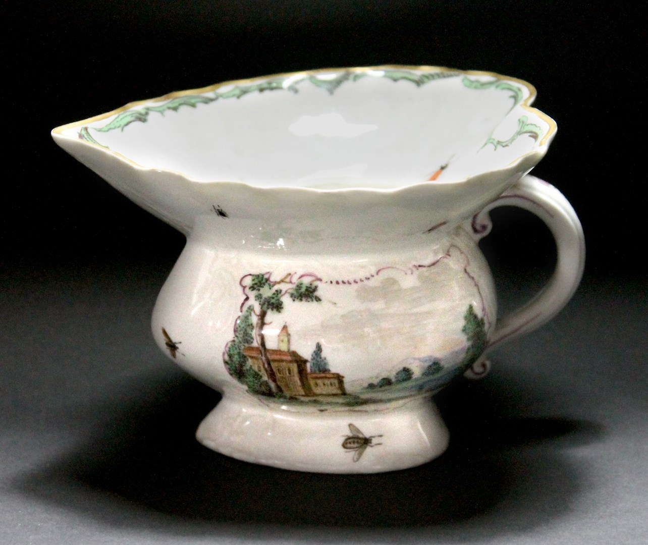 Appraisal: A Hochst porcelain spitoon th century decorated with puce landscape