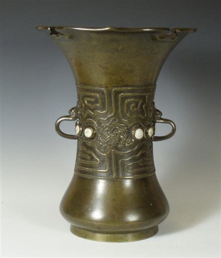 Appraisal: A Chinese patinated bronze vase In the Archaic style with