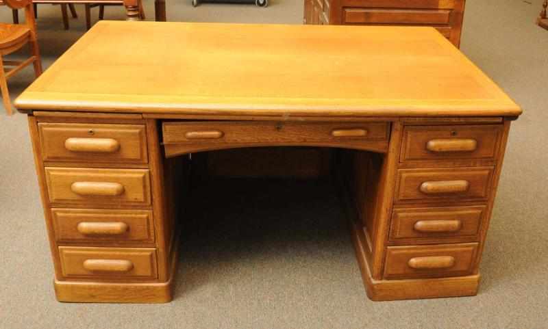 Appraisal: Oak Desk Circa Seven drawers with wooden handles and eight