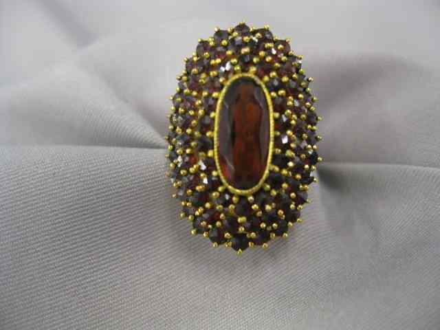 Appraisal: Garnet Ring tiers of gems in k yellow gold