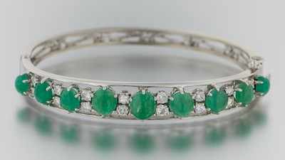 Appraisal: A Ladies' Diamond and Emerald Cabochon Bangle Bracelet k white