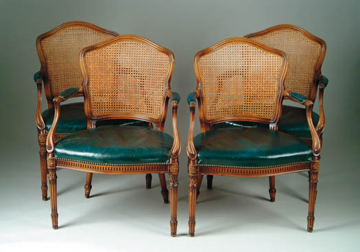 Appraisal: SET OF FOUR FRENCH STYLE ARMCHAIRS Each with shaped caned