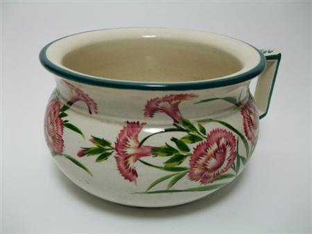 Appraisal: WEMYSS CHAMBER POT CIRCA decorated with carnations impressed mark 'Wemyss