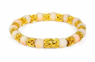 Appraisal: A Gold and Coral Bracelet A Gold and Coral Bracelet