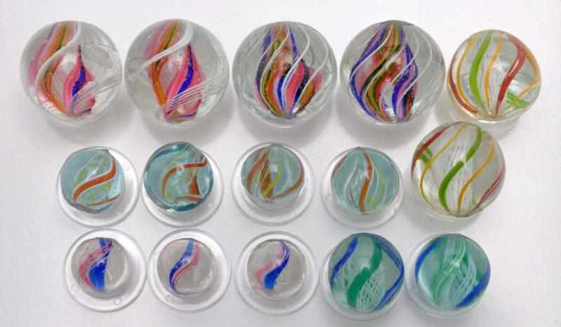 Appraisal: Lot of Same Cane Swirl Marbles Description Includes a group