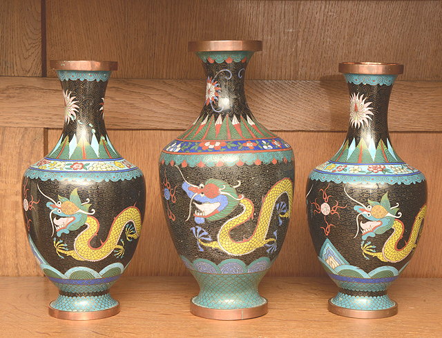 Appraisal: A GARNITURE OF THREE CHINESE CLOISONNE VASES each decorated with