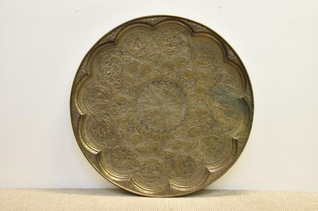 Appraisal: Large bronze Persian round table top decorated with figures and