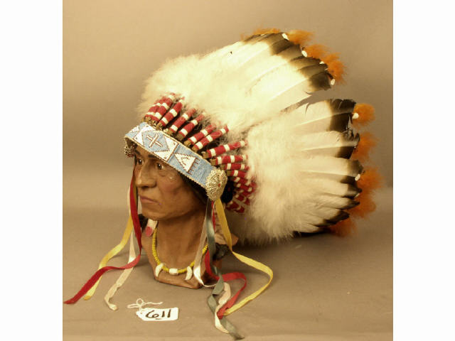 Appraisal: Vintage Plains feathered head dress with beaded band showing good