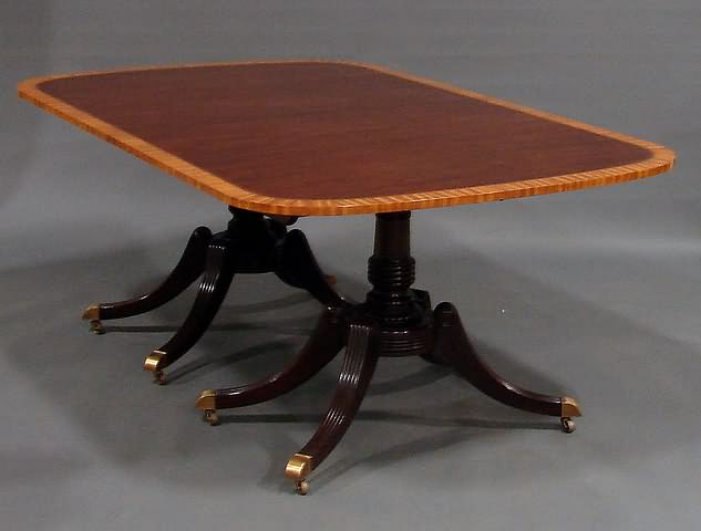 Appraisal: Extension top with rounded ends and corners cross-banded blonde mahogany