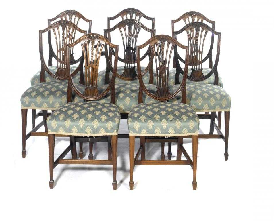 Appraisal: A SET OF EIGHT MAHOGANY DINING CHAIRS the moulded shield