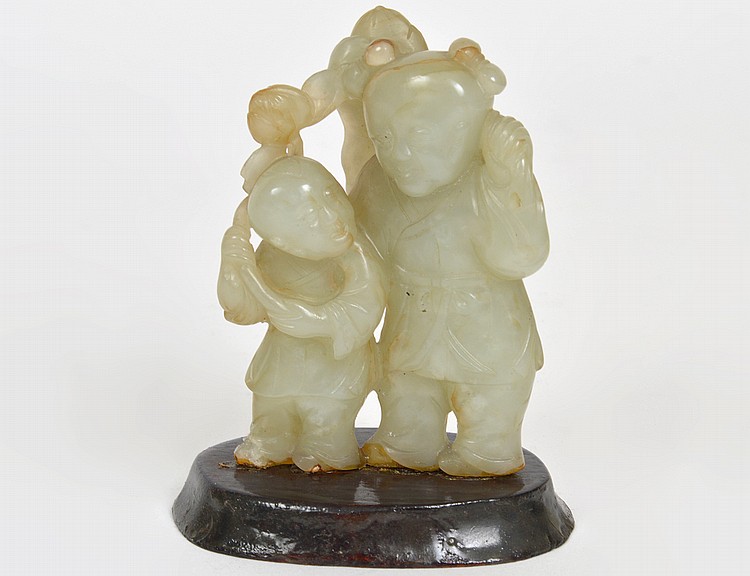 Appraisal: CHINESE CELADON JADE FATHER AND SON GROUP th Early th