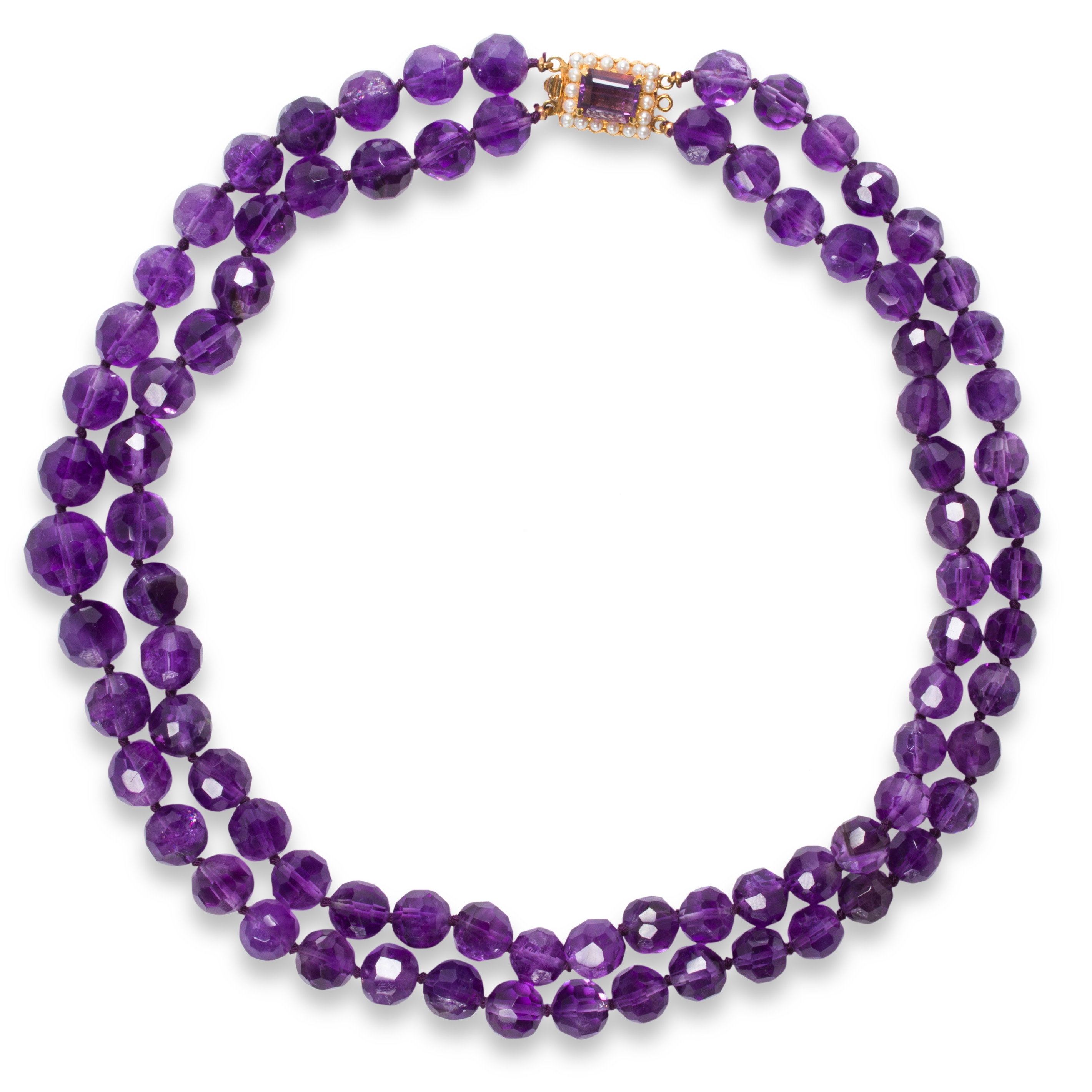 Appraisal: AN AMETHYST AND NINE KARAT GOLD NECKLACE An amethyst and